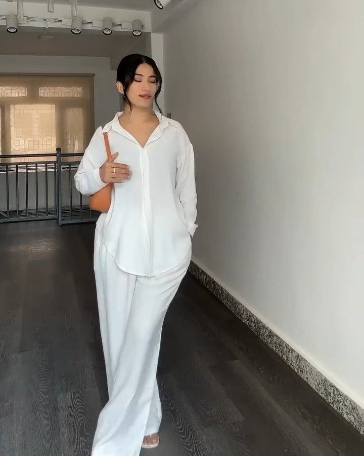 White button-down shirt and pants co-ord set