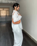 White button-down shirt and pants co-ord set
