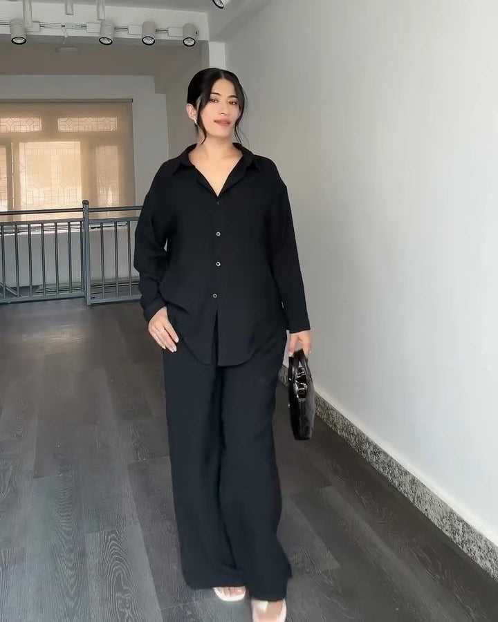 Black button-down shirt and pants co-ord set